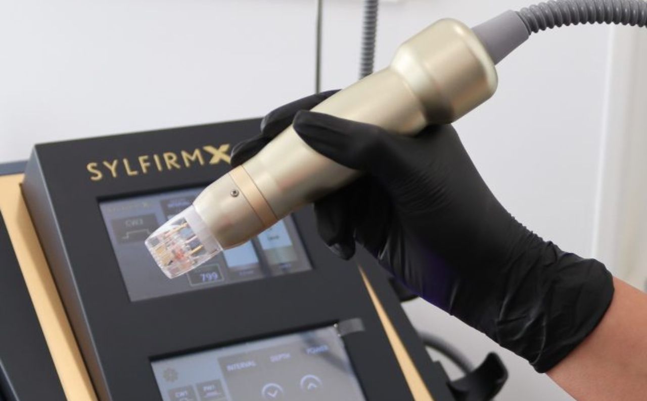 Dermatologist using the Sylfirm X device at Millennium Clinic KL, demonstrating advanced skin treatment for melasma, hyperpigmentation, and skin rejuvenation.