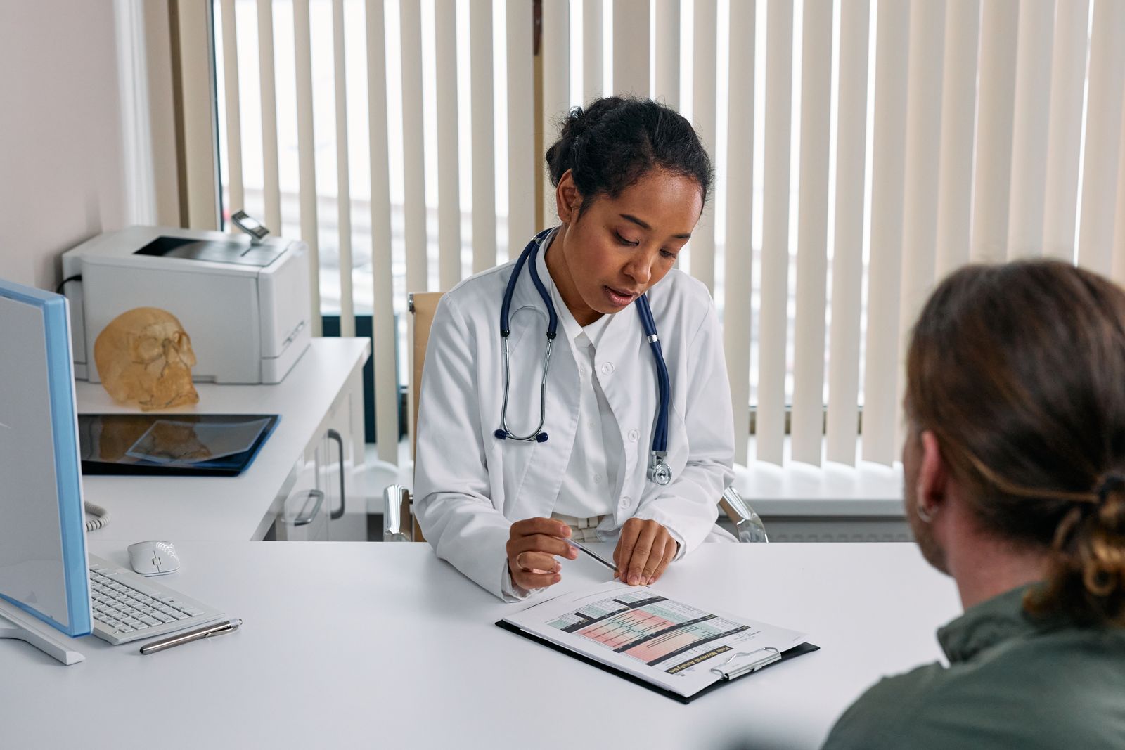 Patient discussing a personalised treatment plan with a doctor