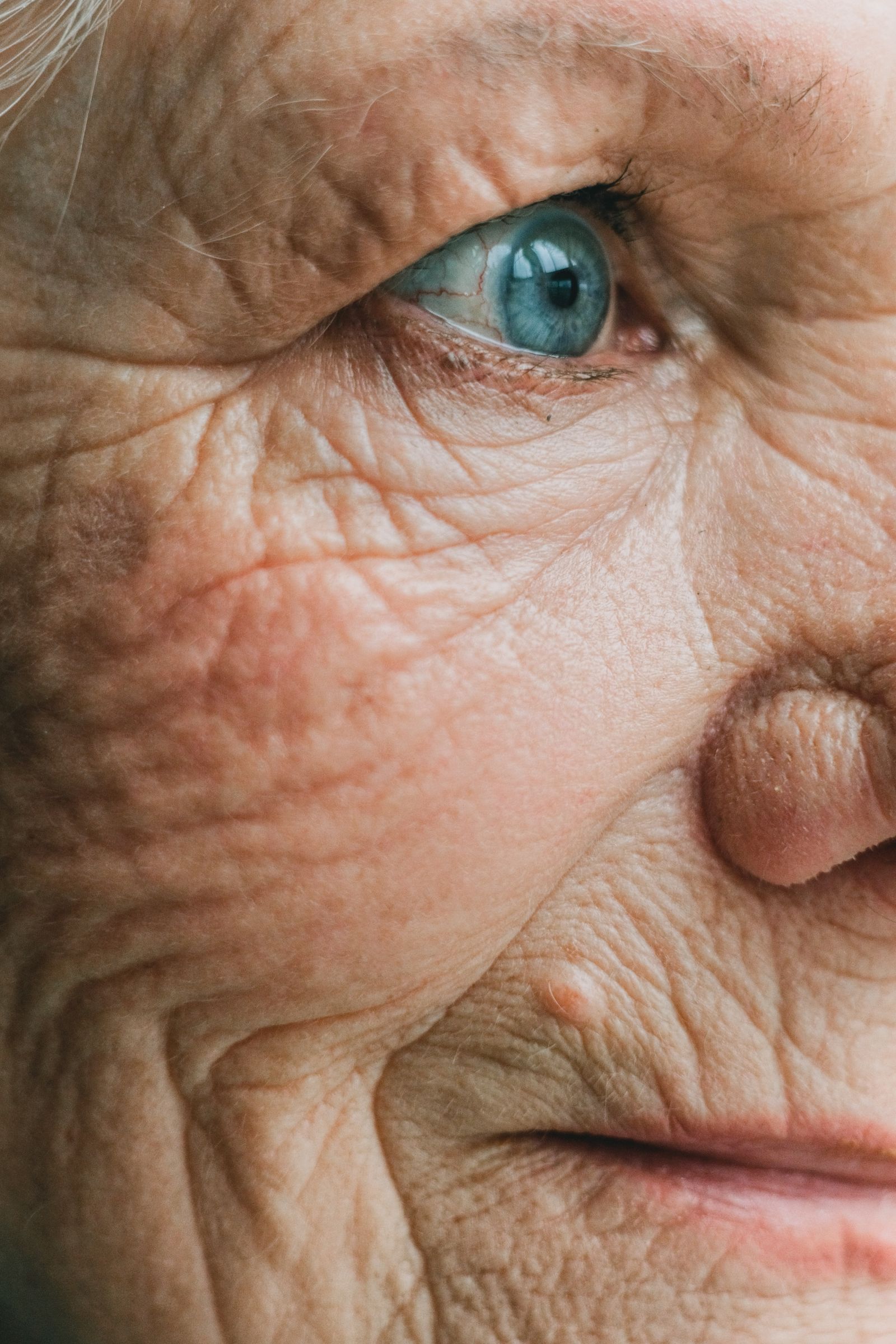 Close-up of natural lines around a mature woman’s eye