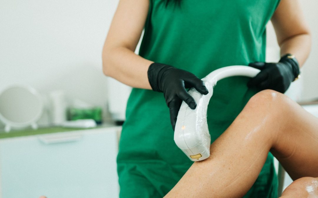 Laser hair removal session performed with protective eyewear in a clinical setting