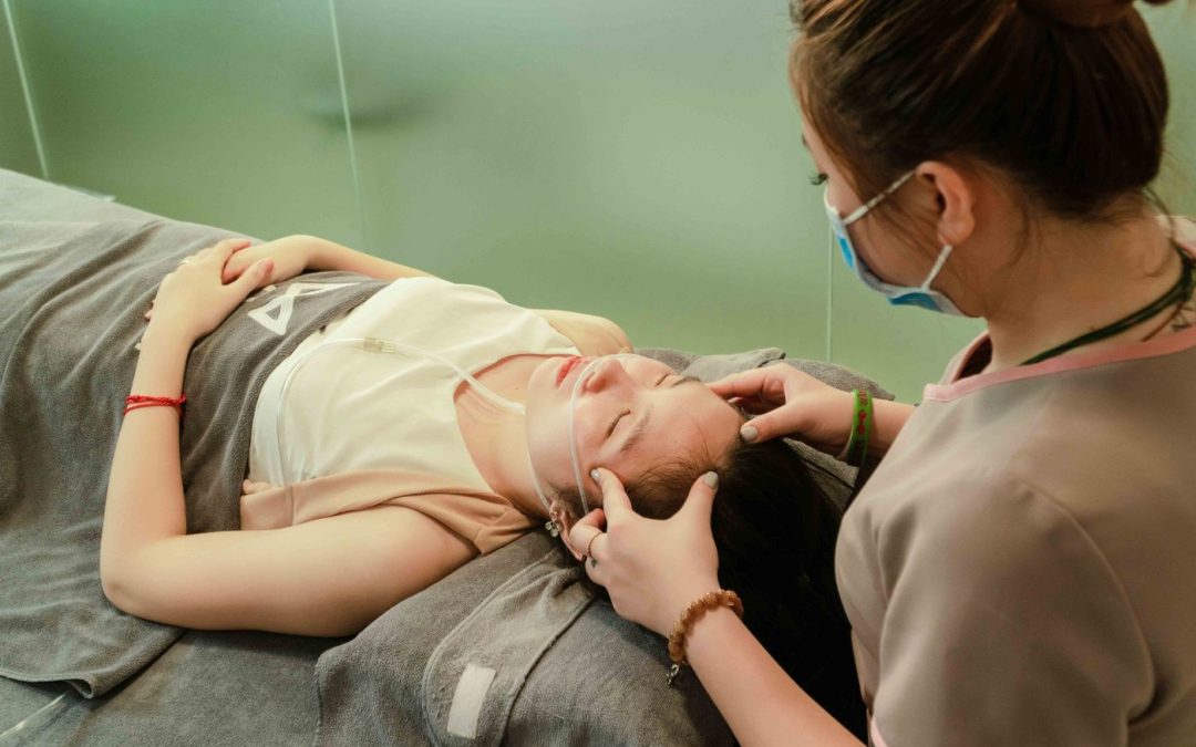 Practitioner assessing facial skin before a treatment decision